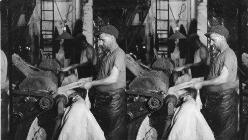 "Shaving Machine" Excess flesh shaved off by roller knives set in spiral form, Standard Kid Manufacturing Co., Wilmington, Del