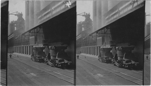 Pouring Molten Iron from furnace into ladle, Capacity of ladle from 75 to 90 tons, Ford Motor Co., Detroit, Mich