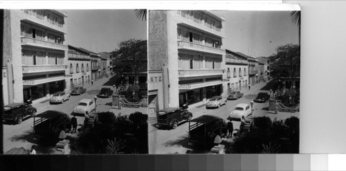 The downtown section of the city has many modern buildings and excellent shops. Street scene from the medical buildings of the university. Tegucigalpa (its name comes from Indian words meaning "silver hills") was founded in the 16th century at the foot of Mt. Picacho and is 3300 ft. Above sea level, 100 miles from the pacific ocean and 200 from the Atlantic. Until the coming of the commercial airline activities in central America about 20 years ago, the capital [capitol] city was a very remote place because of the lack of railroads and good traffic roads throughout the country. With the coming of the airplane, Tegucigalpa has become a very active city as well as a very modern one. Tegucigalpa, Honduras, Central America