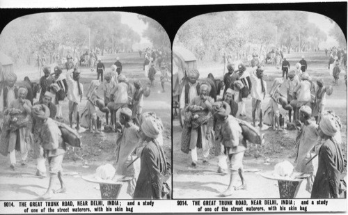 Inscribed in recto: 9014. THE GREAT TRUNK ROAD, NEAR DELHI, INDIA; and a study of one of the street waterers, with his skin bag