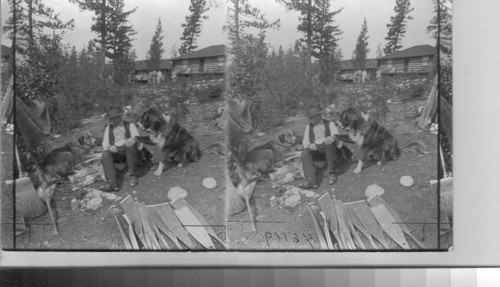 The old boat keeper at Jasper Park Lodge with his two thorough-bred St. Bernard dogs. Alta. Canada