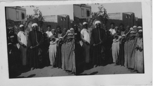 An Oriental Snake Charmer and Crowd of Natives Onlookers Cairo