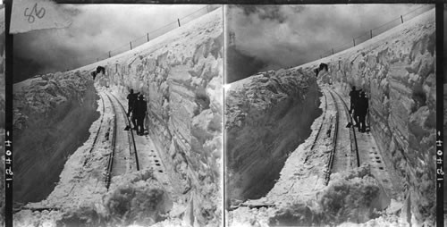 Shoveling out the Famous Cog Railway 2000 ft. below the Summit. Pike's Peak