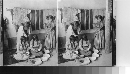 Primitive Artists, Indian women decorating pottery, Hopi Reservation, Arizona