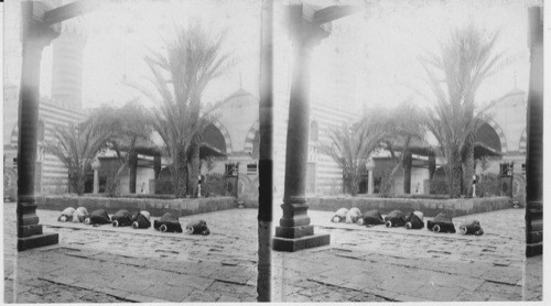 The Prayer Niche- Egyptian worshiping in a mosque. Egypt