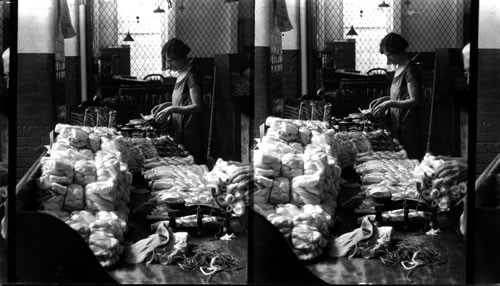 Weighing raw silk, S. Manchester, Conn