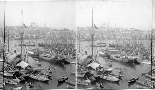 Domes and minarets of Stamboul from rigging of ship at anchor. Constantinople Tour. Turkey