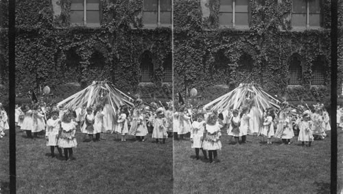 Children of Grace Church Day Nursery. Broadway and 11th St. N.Y. Enjoying a May party on front lawn in from of the Rectory, just off the busiest thoroughfare in the world