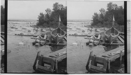 Indians poling back their canoes over the Rapids after landing their passengers below the Falls. Ontario or Mich