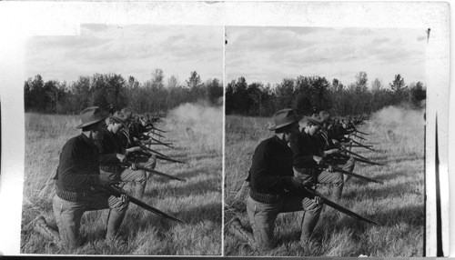 Hot shot on the firing line, American troops fighting the Filipinos. Spanish-American War