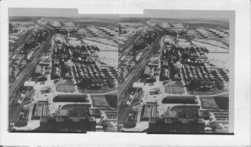 General view of Ponca City's General Office Bldg., Refinery, And Tank Farm--Continental Oil Company Ponca City, Oklahoma. NOTE: (IF THIS SUBJECT IS USED, GIVE CONTINENTAL OIL COMPANY CREDIT LINE). Copy supplied by Continental Oil Co