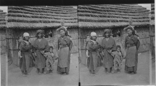 Dwarf-like Ainu women and children, Island of Yezo, Japan