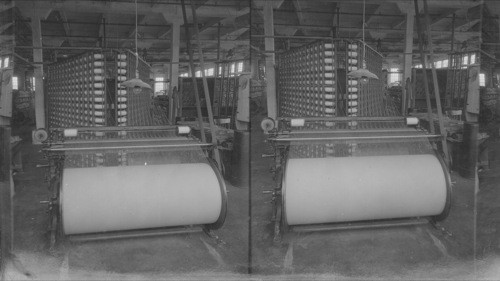 Cotton Warper which takes cotton thread from spools to large warping beam, Guelph, Can