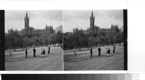 Great Britain, Scotland, Glasgow: The University of Glasgow's main building, with the pitch and putt green of Kelvingrove Park in the foreground. The University of Glasgow was founded in 1451, but did not occupy this building - designed by Sir Gilbert Scott - until 1870. The tower is 300 ft. high and 525 ft. across the front facade