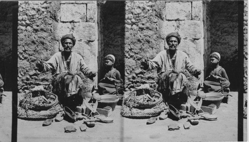 Arab shoemaker at work in the streets, Cairo, Egypt