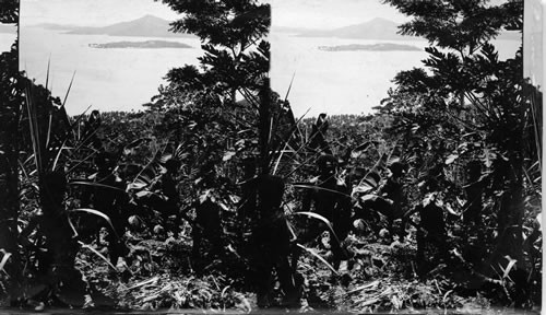 A negrito family among the banana & papaya trees, Philippines