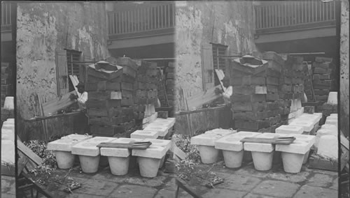 Filtering stones, carved from corral lime-stone ready for export. Bridgetown. Barbados