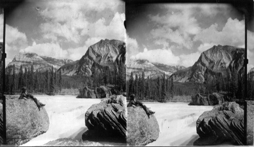 Mt. Stephen and Mt. Dennis from Natural Bridge on Kicking Horse River. Field, B.C., Can