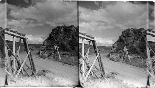 Irrigation in Colo. about 7,000 ft. Valleys on either side of the road are irrigated from mountain streams. Alfalfa and beets are grown. Sharply descending grades to the Valley of Gunnison River at Cimmaron east of Montrose. Water comes over the cliff just out of this view at the right where it was used on a field