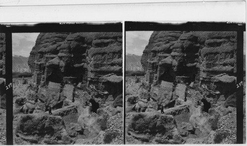 249 Some of the caves in the red sandstone cliff near Bamian are still inhabited by poor peasants. (Slight resemblance to Indian cliff-dwellings in Arizona, etc.)