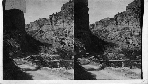 On the winding road up Williams Canyon to the Cave of the Winds, Colo. Have taken again Nov. 1925 Out of Manitou. Make over if possible, auto, not red marker