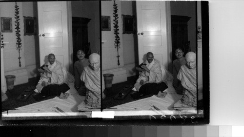 "The Universal Appeal of the stereograph - Mahatma Ghandi, Mystic and Teacher Receives Keystone photographer at his London office."