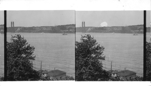 Looking west from Riverside Drive neat 125th St. to the Palisades, At left one of the iron frame of the New Hudson River Bridge