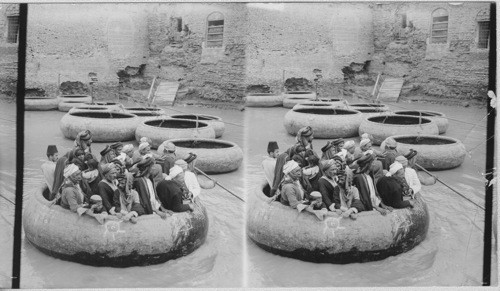 Peculiar round boats called “Kufas’ on the Tigris River at Bagdad, Mesopotamia