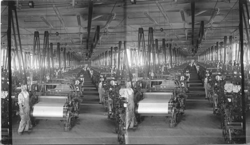 Weaving plain silk cloth - hundred of automatic looms in a modern American silk mill. Paterson N.J