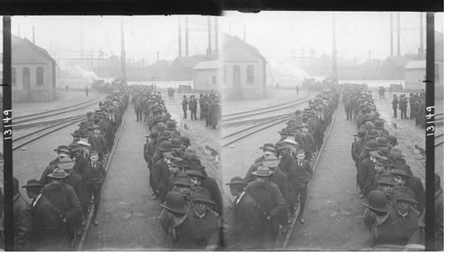 Payday at the Steel Works - Lines of men approaching pay car, Homestead, Penna