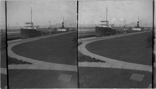 N.E. to Freighter coming thru after Locks were filled, (looking toward Canada) Sault Ste. Marie, Mich