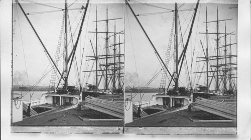 Loading great sailing vessels with lumber. Portland, Oregon