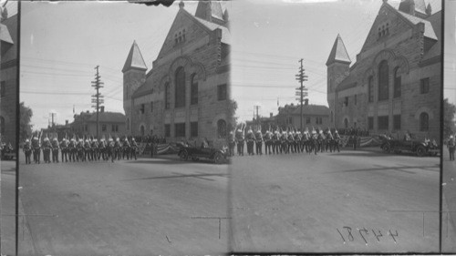 Pres. Harding reviewing British Marines, 4th of July Parade as they pass from ship curlew