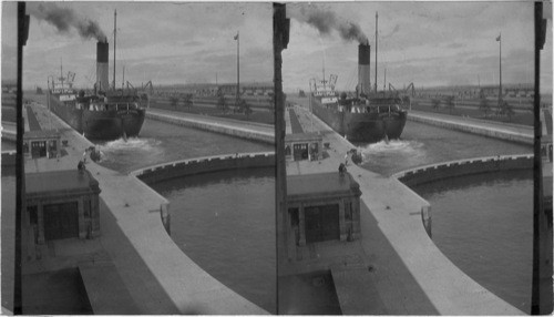 West in Poe Locks, Lock's full of water and Boat ready to go into Lake Superior. Soo, Michigan