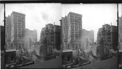In the heart of the fire district Continental Building (left) and B & O. (right). South from Post Office. Baltimore. Fire