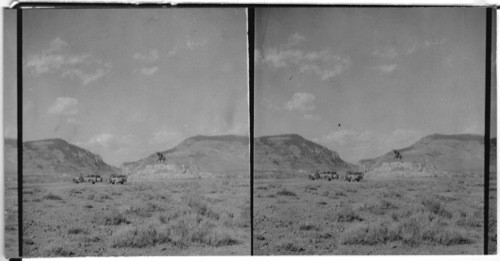 Cedar & Rattlesnake Mts. & Shoshone Canyon, Buffalo Bill Statue in Foreground