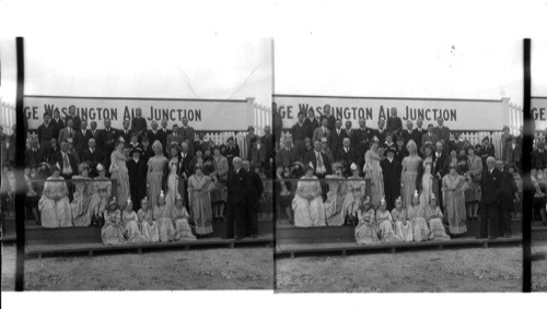 Group of people dressed as per the time of Geo. Wash [George Washington], during a similar occasion when a balloon ascended. Geo. Washington Airport, Washington,D.C