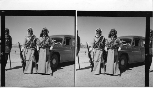 41 Picturesquely uniformed soldiers of the Arab Legion in Jordan. They belong to the camelcorps. Some platoons of the camel corps are stationed at the Jordan-Iraq border. (Their women’ skirt-like uniforms earned them the nickname of Glubb’s girls, Brig. Gen. Sir John Baggot Glubb and Englishman, has been C. in C. of the Arab Legion, Jordan’s Army. This picture is actually taken in Jordan