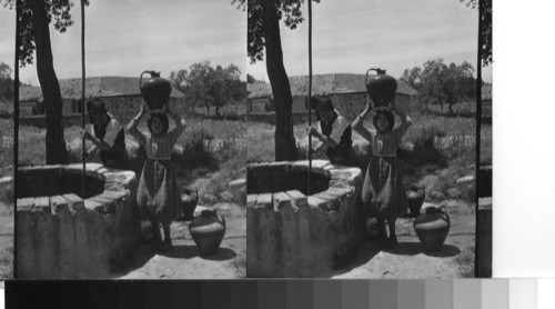 Portuguese peasants at a well near Alcobaça, Portugal