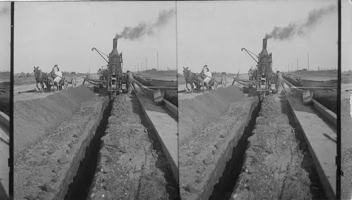 Digging a ditch with a steam shovel. Long Island. N.Y