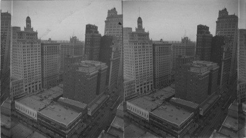 Looking N.E. over Dallas from 9th floor of Santa Fe Bldg. Corner of Griffin & Commerce St., at right is Baker Hotel, at left Magnolia Bldg. and Adolphus Hotel, Dallas, Texas