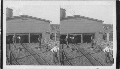 Chicago and North Western Wood Preserving Plant - N. from Sup't (superintendent) office, showing retort house preparatory to to changing of the cylinders. Escanaba, Mich