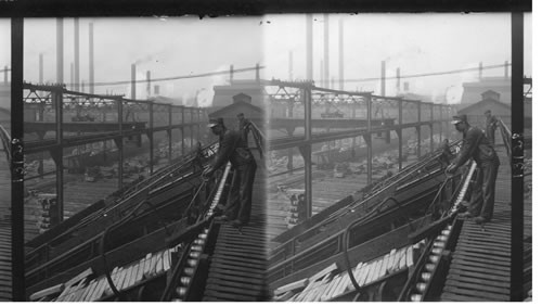 Hopper and cranes for loading steel billets in car. Homestead, Penna