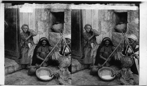 Churning butter in a goat skin, Beeroth, Palestine