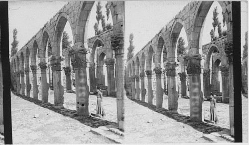 Arabic arcade formed from ancient pillars and capitals - Baalbek, Syria