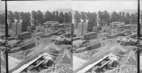 End of lumber flume at the lumberyards on the railroad