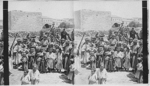 Women going to the wedding feast with food, Ramallah, Palestine