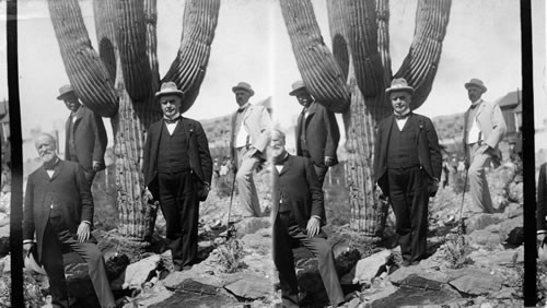 Pres. McKinley beside a giant cactus in Arizona