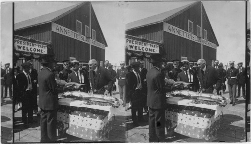 Pres. Harding inspects some Alaskan Salmon