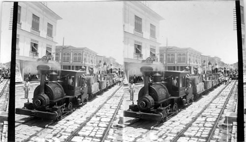 How imported goods are carried from Custom House - railway along street in Guayaquil, Ecuador